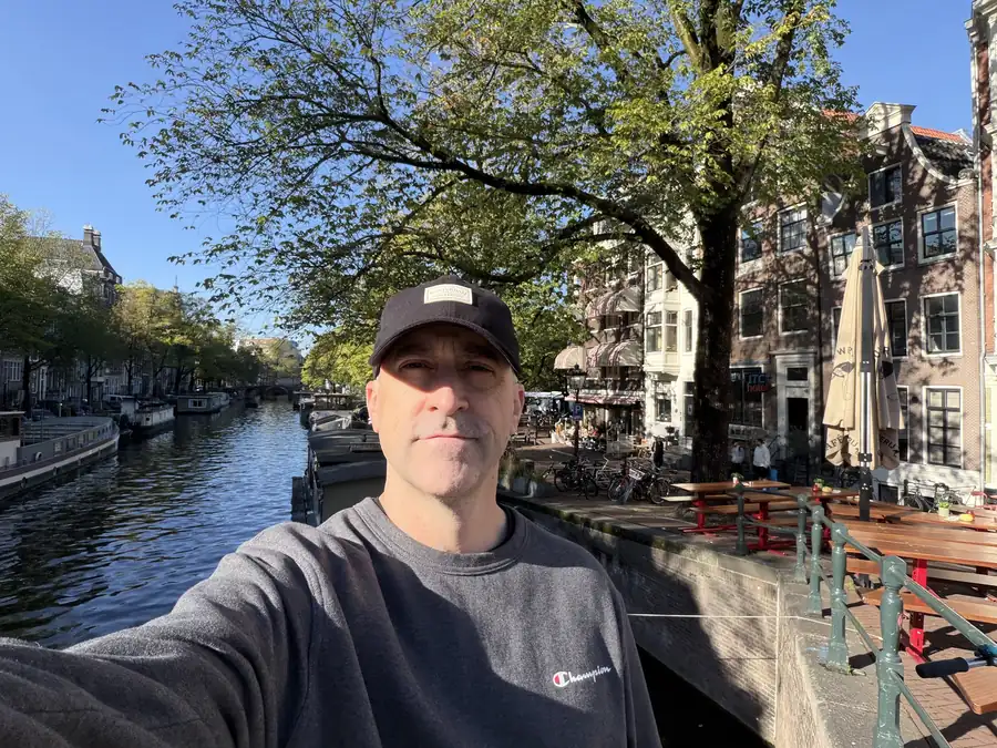 Jeremy on a canal bridge, photographed by Jeremy