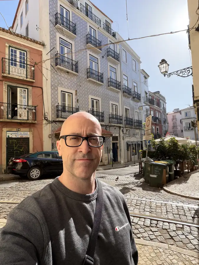 Jeremy in the lanes of Alfama, photographed by Jeremy